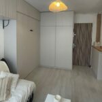 Rénovation et agencement d'un hall d'entrée avec sas.